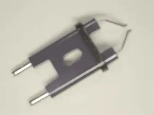 Elektrodenblock von Remeha in grauer Farbe mit zwei Metallstiften und einer zentralen Aussparung, geeignet für den Einsatz in Heizsystemen.